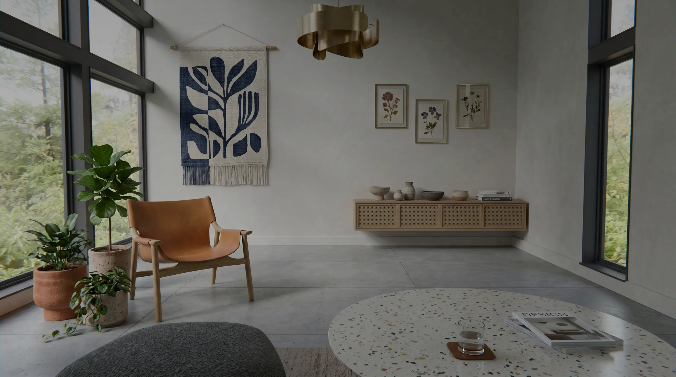 Wohnzimmer mit Ledersessel, Terrazzo-Couchtisch und Holzsideboard